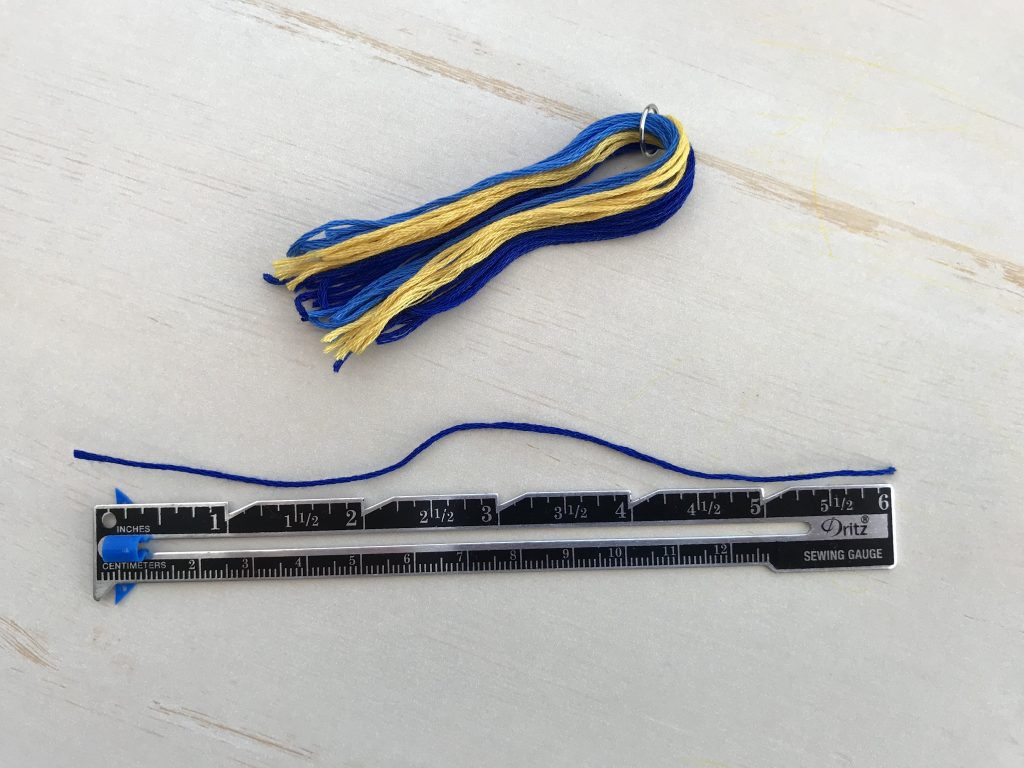 Keychain Tassel: Cut 6" thread to wrap the top of the tassel.